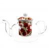 Teiera in vetro con infusore con fiori rossi